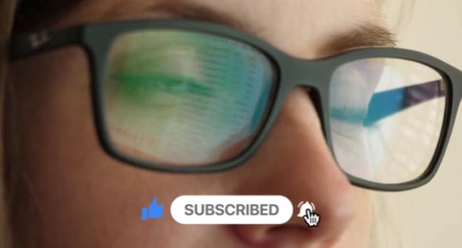 Hand cursor clicking on animated YouTube buttons