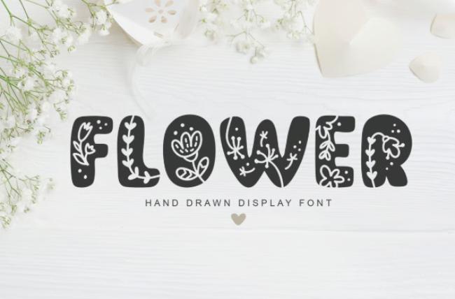 Flower Hand Drawn font displaying artistic handcrafted letters with hand-sketched floral illustrations and organic textures